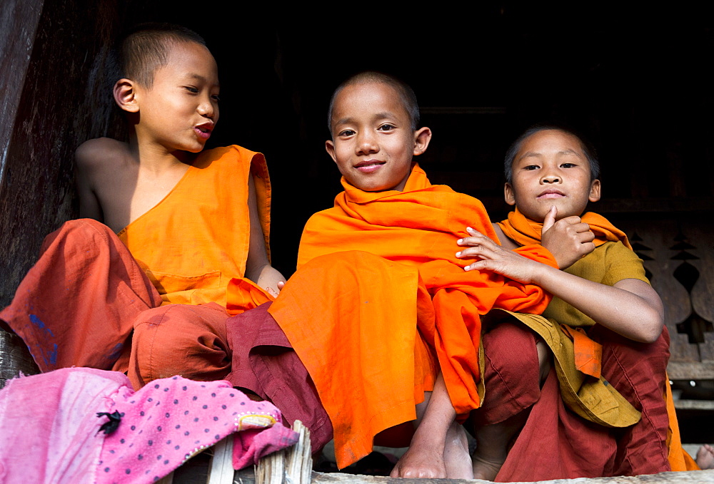 Three novice monks in village near Kengtung (Kyaingtong), Shan State, Myanmar (Burma), Asia