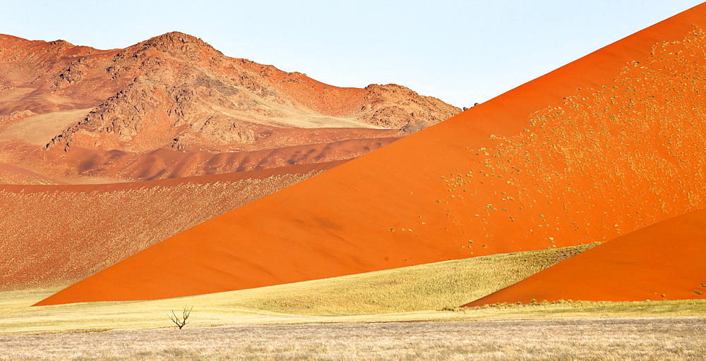 Overlapping orange sand dunes of the ancient Namib Desert near Sesriem, Namib Naukluft Park, Namibia, Africa