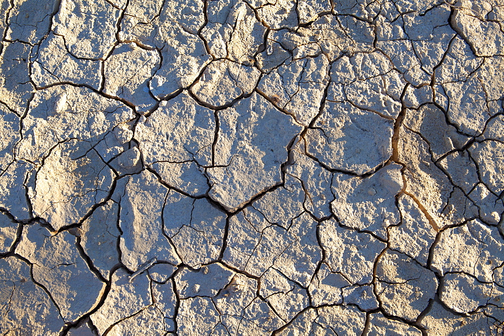 Dried mud/cracked earth at Sossusvlei in the ancient Namib Desert near Sesriem, Namib Naukluft Park, Namibia, Africa