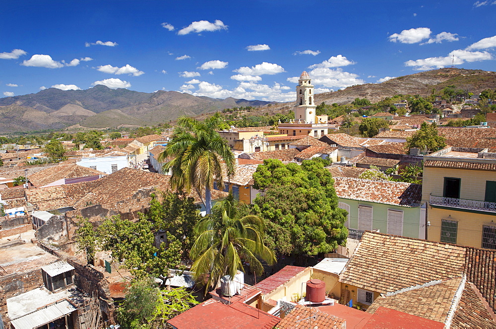 View over pantiled rooftops of the town towards the belltower of The Convento de San Francisco de Asis, Trinidad, UNESCO World Heritage Site, Cuba, West Indies, Central America 