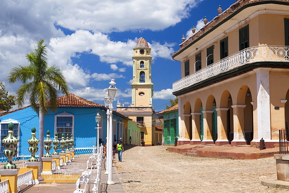 View across Plaza Mayor towards Museo Romantico and the belltower of The Convento de San Francisco de Asis, Trinidad, UNESCO World Heritage Site, Cuba, West Indies, Central America 