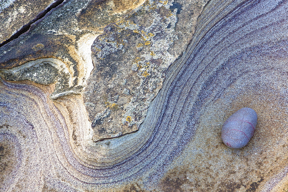 Patterns created by sea erosion on rocks at Rumbling Kern, near Howick, Alnwick, Northumberland, England, United Kingdom, Europe