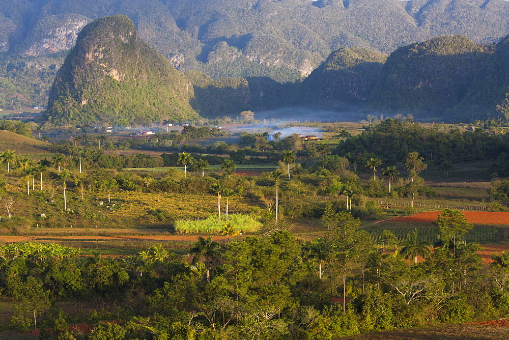 Vinales Valley, UNESCO World Heritage Site, bathed in early morning sunlight, Vinales, Pinar Del Rio Province, Cuba, West Indies, Central America