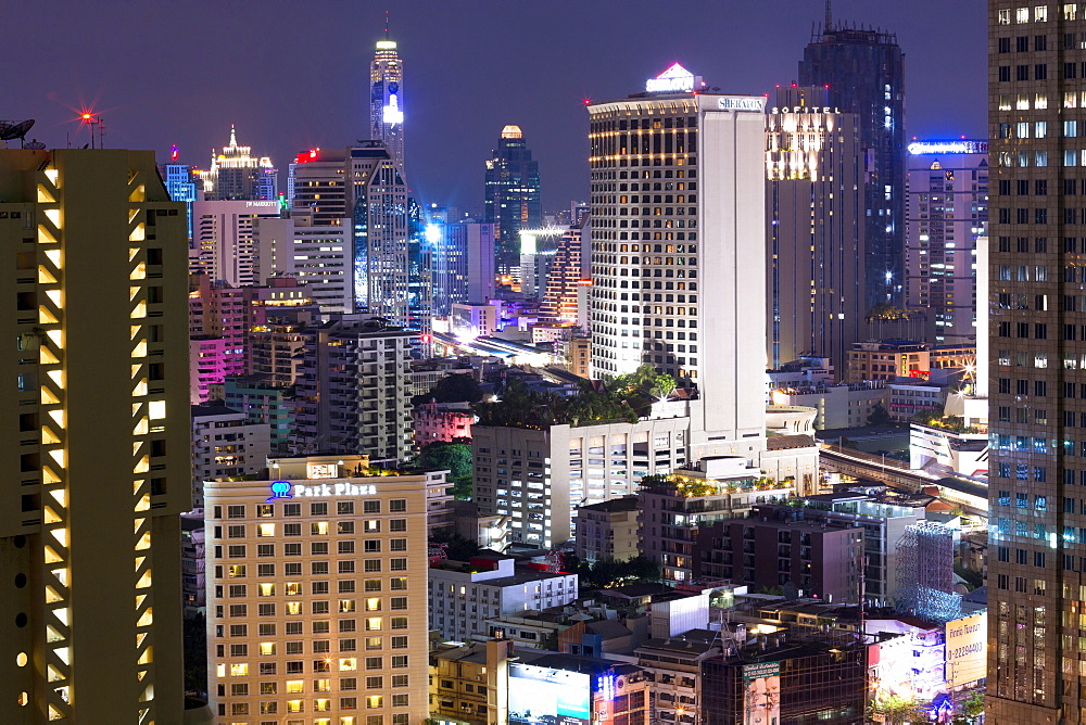 High rise buildings of Bangkok at night from Rembrandt Hotel and Towers, Sukhumvit 18, Bangkok, Thailand, Southeast Asia, Asia