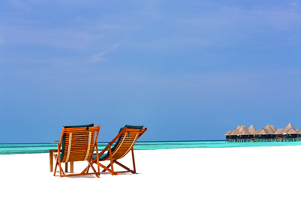 Wooden sun loungers on beach, Coco Palm, Dhuni Kolhu, Baa Atoll, Republic of Maldives, Indian Ocean, Asia