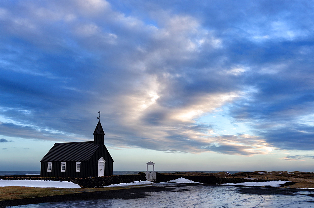 Winter view at dusk of black wooden church at Budir, Snaefellsnes Peninsula, Iceland, Polar Regions