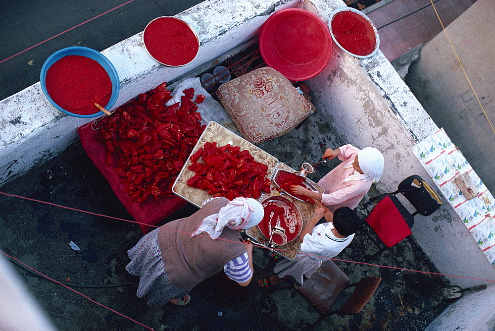 Women making red pepper sauce, old city area, Istanbul, Turkey, Europe