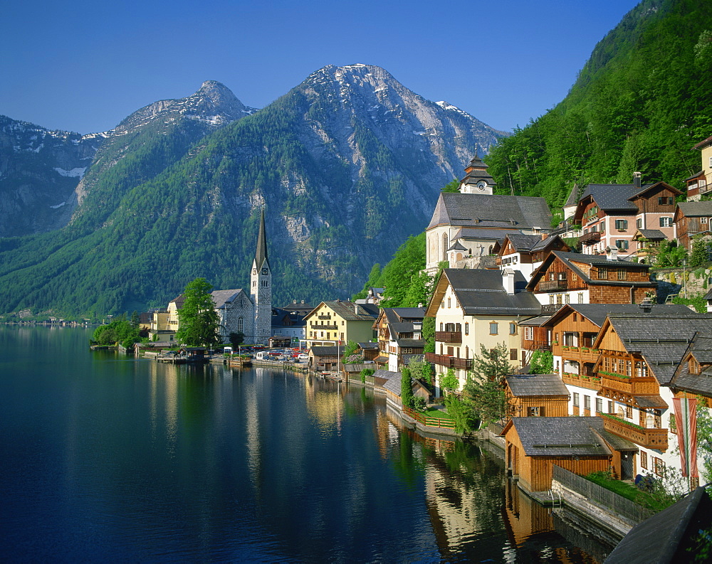 Houses, chalets and the church of the village of Hallstatt beside the lake, in morning light, UNESCO World Heritage Site, near Salzburg in the Salzkammergut, Austria, Europe