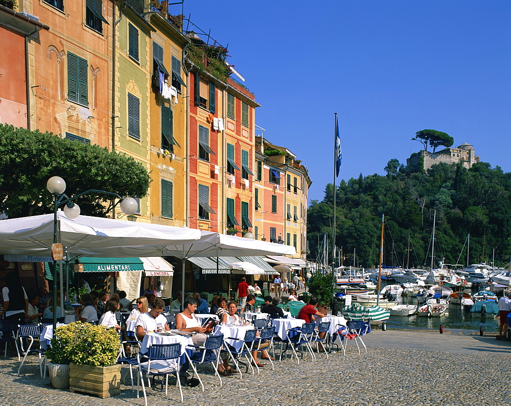 A pavement cafe on the waterfront at Portofino, in Liguria, Italy, Europe