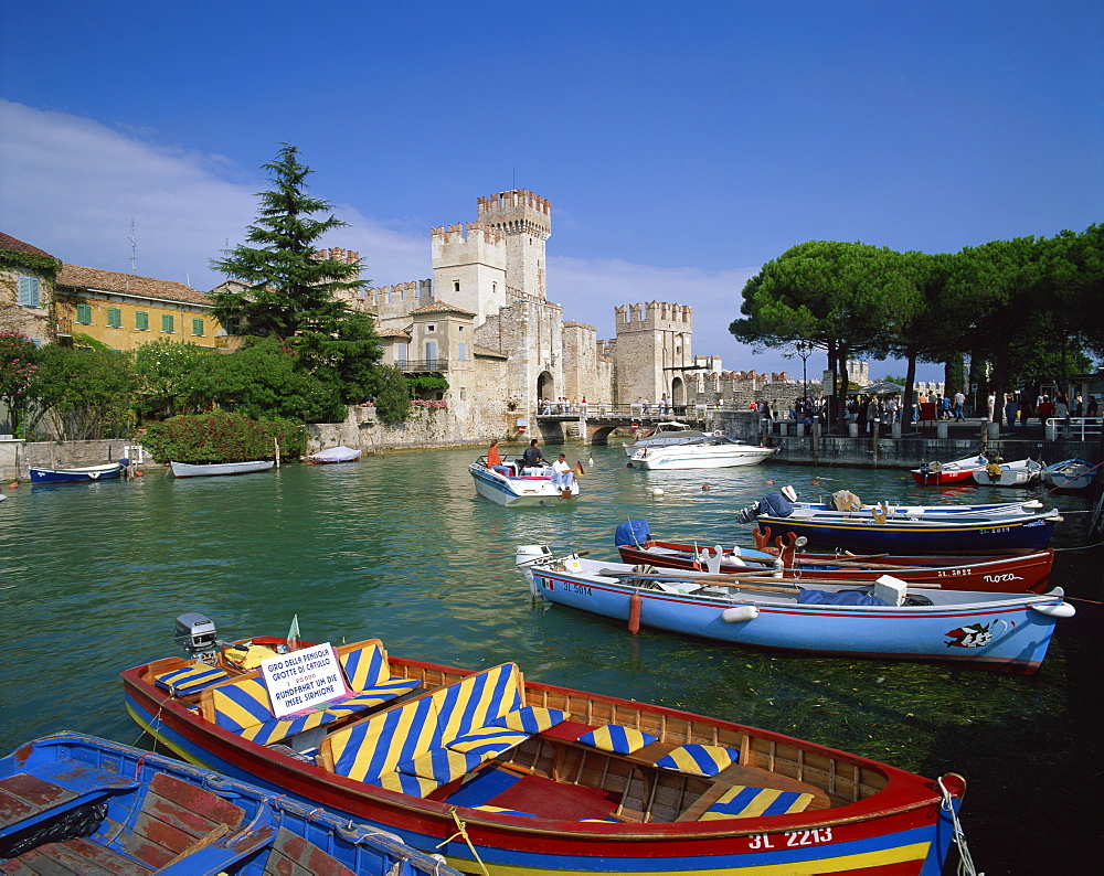 Moored boats at Sirmione on Lake Garda, Lombardy, Italy, Europe