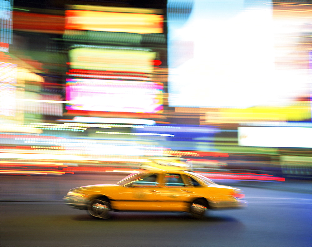 Taxi at speed in Times Square, New York City, New York State, United States of America, North America