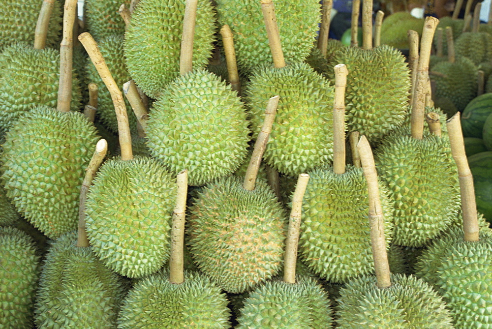 Durian fruit piled up for sale in Bangkok, Thailand, Southeast Asia, Asia