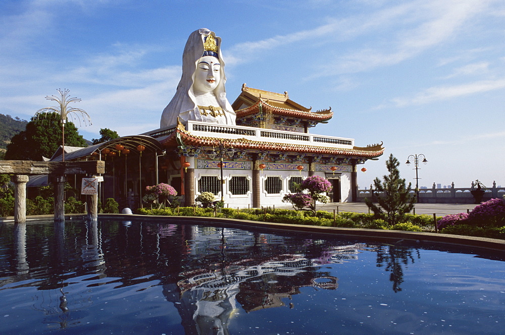 White Kuan Yim statue shrine and pond, Kuan Yim temple, Penang Island, Malaysia, Southeast Asia, Asia