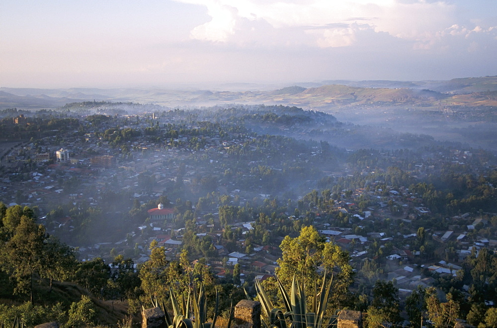 Aerial view of the town, with early morning mist, taken from Goha Hotel, Gondar, Ethiopia, Africa