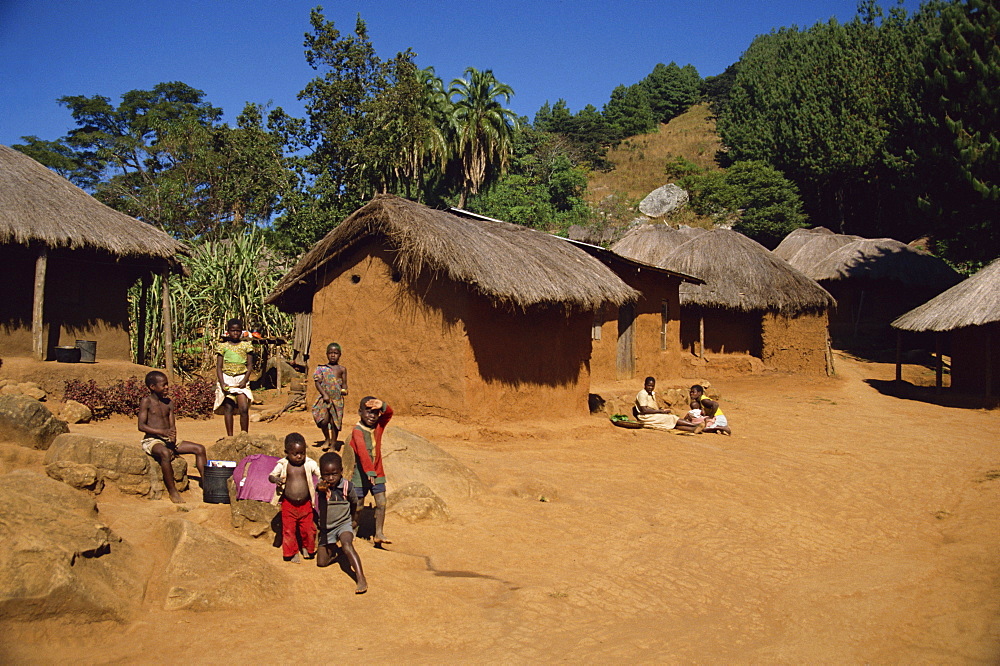 Village scene, children in foreground, Zomba Plateau, Malawi, Africa