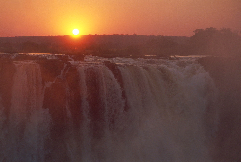 Sunrise over Main Falls, Victoria Falls, UNESCO World Heritage Site, Zimbabwe, Africa