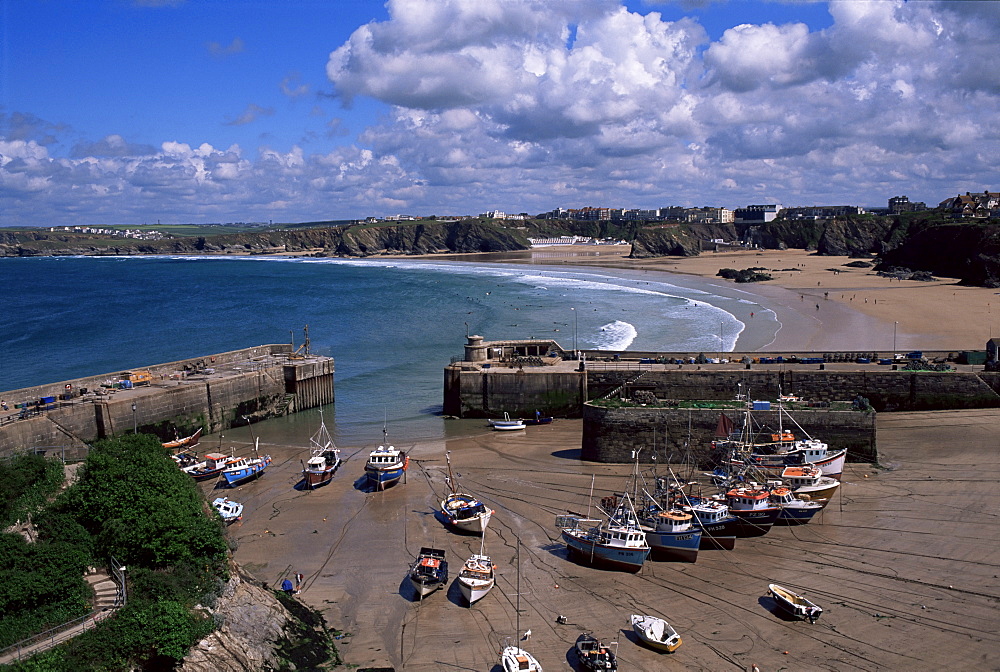 Harbour at low tide with town beach beyond, Newquay, Cornwall, England, United Kingdom, Europe