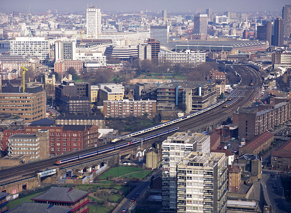 View over Vauxhall with Eurostar and other trains approaching Waterloo station, London, England, United Kingdom, Europe