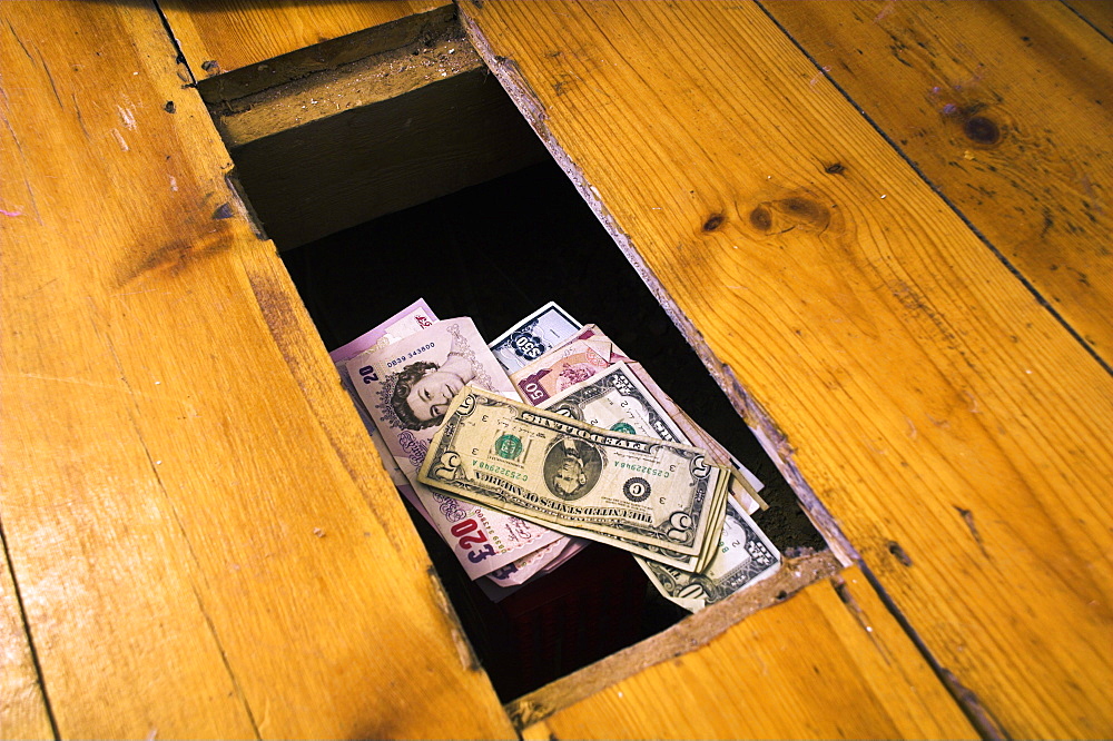 Money beneath the floorboards