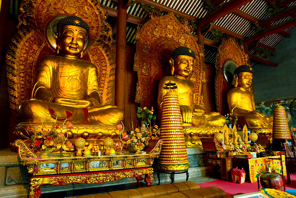 Dafo Buddhist Temple, three statues in interior, Guangzhou (Canton), Guangdong, China, Asia