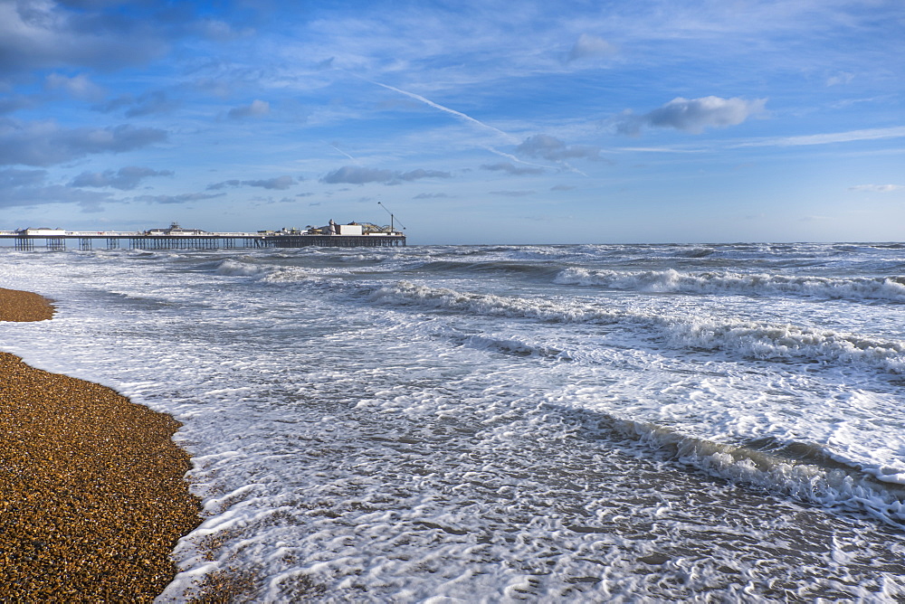 Stormy seas with Palace Pier, Brighton, Sussex, England, United Kingdom, Europe