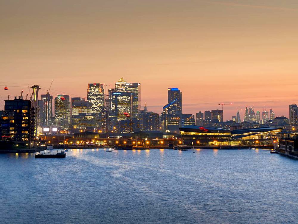 Canary Wharf and City Square Mile cityscape from Royal Victoria dock, Docklands, London, England, United Kingdom, Europe