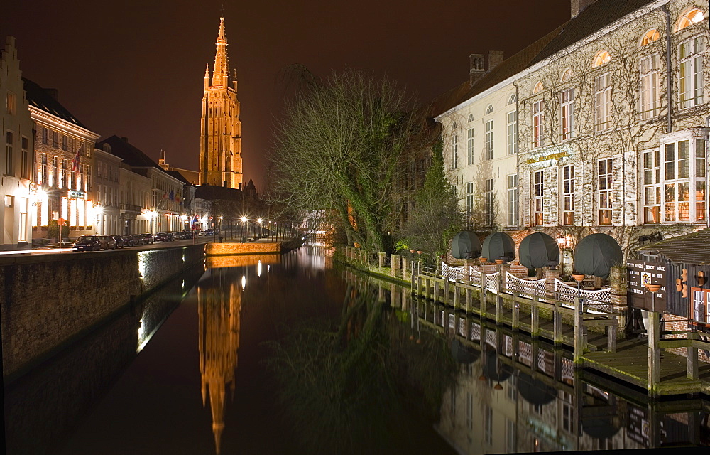 Looking south west along Dijver, towards The Church of Our Lady (Onze Lieve Vrouwekerk), Bruges, Belgium, Europe