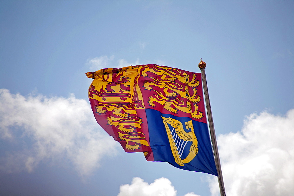 The Royal Standard flying above Buckingham Palace showing the Queen in residence during the 2012 Trooping the Colour ceremony, London, England, United Kingdom, Europe