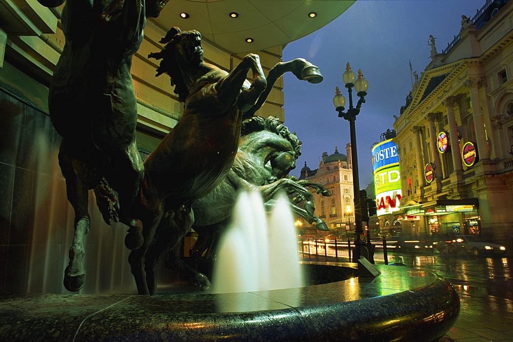 Water fountain with horse statues, Piccadilly Circus, London, England, United Kingdom, Europe