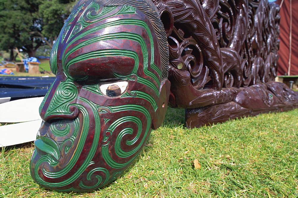 Maori carving of a face, canoe, Okahu Bay, Auckland, North Island, New Zealand, Pacific