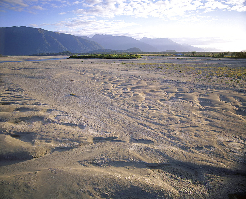 Flood plain with sand depressions, Haast River Valley, from road to Haast Pass, the start of the main divide, Haast, Westland, South Island, New Zealand, Pacific