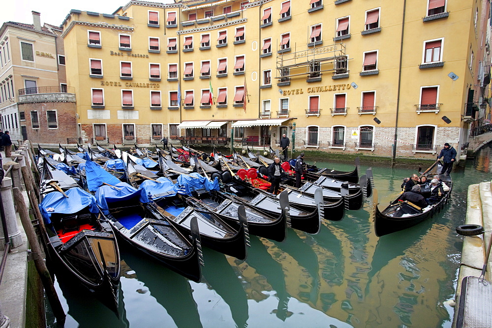 Gondolas outside Hotel Cavalletto, Bacino Orseolo Gondole, Venice, UNESCO World Heritage Site, Veneto, Italy, Europe