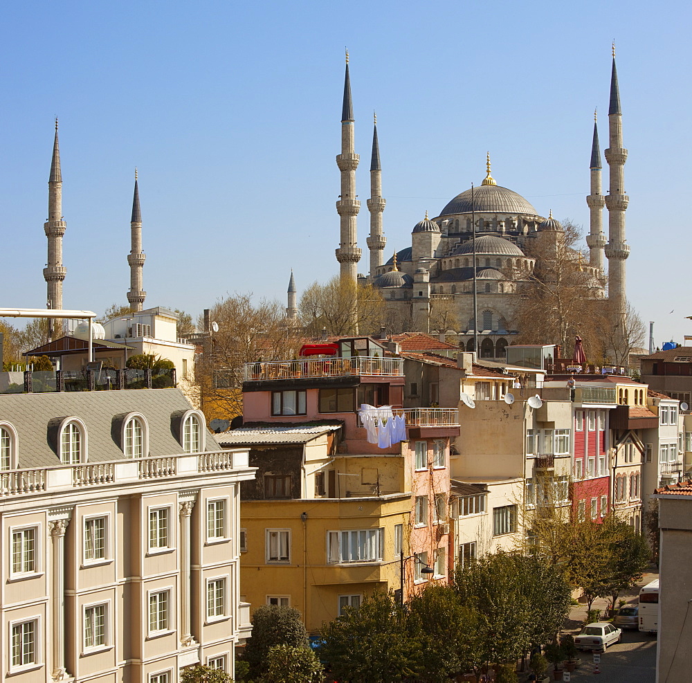 Roof-top hotel cafes overlooked by the Blue Mosque, Istanbul, Turkey, Europe