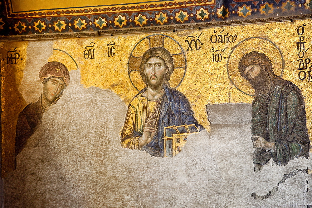 The Deesis Mosaic, depicting Christ Pantrocrator flanked by the Virgin Mary and St. John the Baptist, dating from the Restoration of Constantinople in 1261 at the end of Crusader occupation, Aya Sofya (Hagia Sophia), UNESCO World Heritage Site, Istanbul, Turkey, Europe