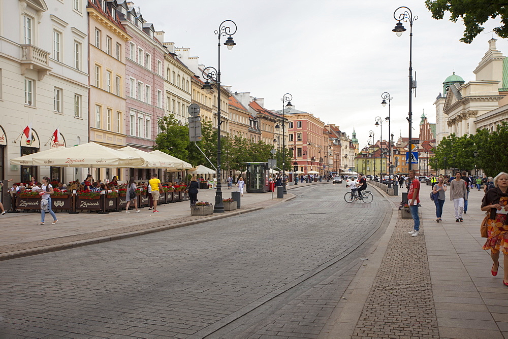 Cobbled Old Town Krakowskie Przedmiescie Street and street cafes, Warsaw, Poland, Europe