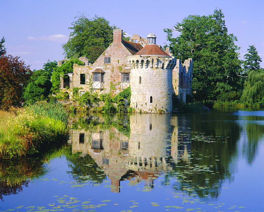 Scotney Castle refelcted in lake, Kent, England