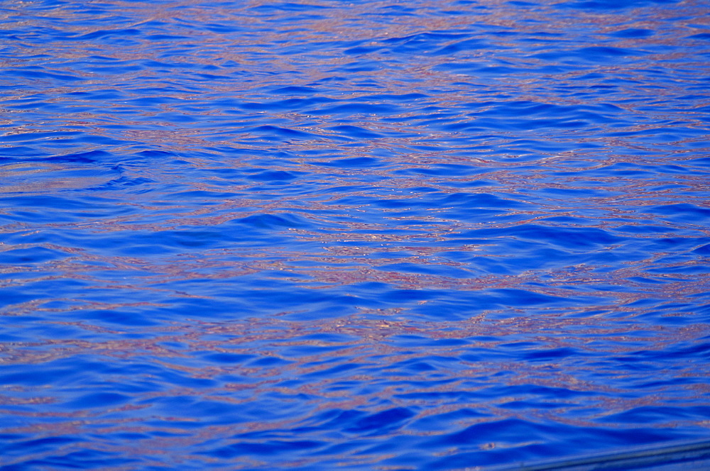 Ripples in water reflecting light and blue sky, San Diego, California, U.S.A., North America