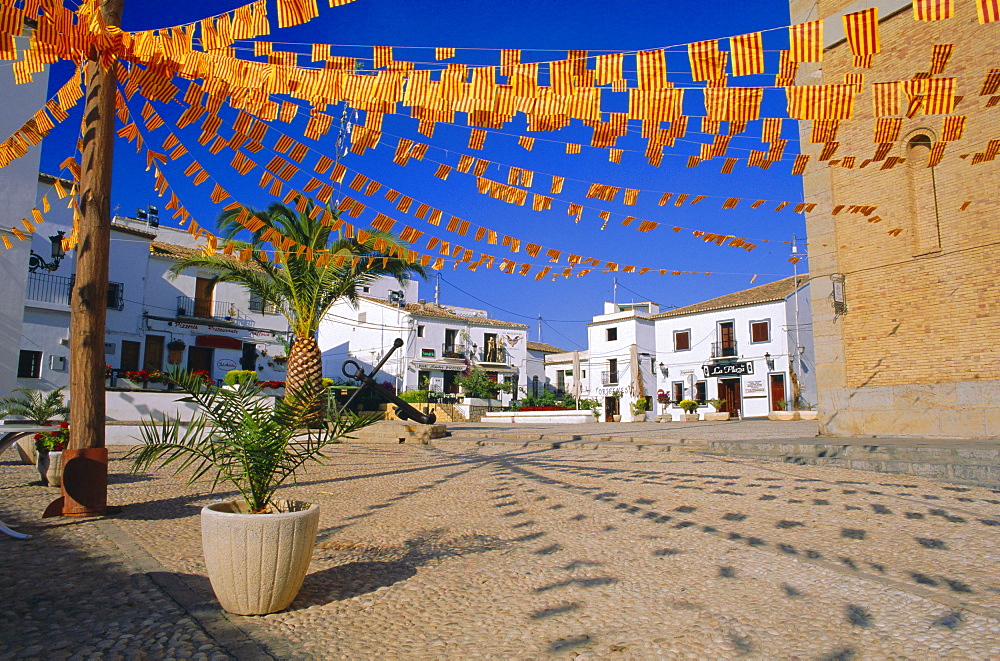 Town square with streamers in regional colours, Altea, Alicante, Valencia, Spain, Europe