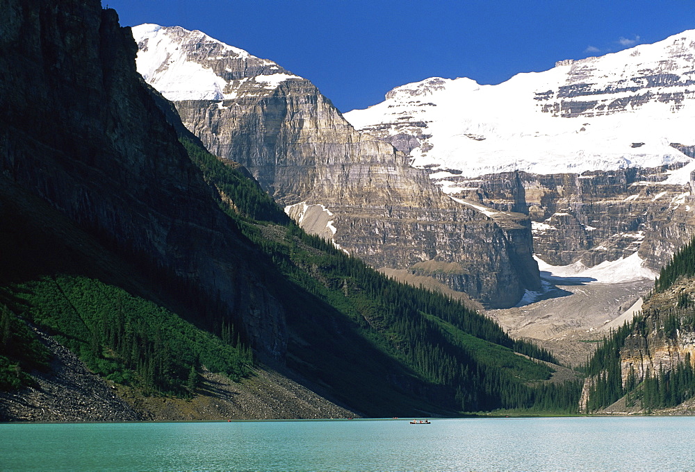 View to Mount Victoria across the emerald waters of Lake Louise, in summer, Banff National Park, UNESCO World Heritage Site, Alberta, Canada, North America