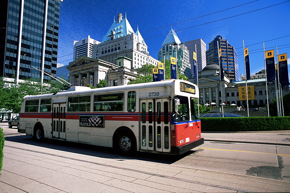 Typical red and white bus, Robson Square, Vancouver, British Columbia, Canada, North America