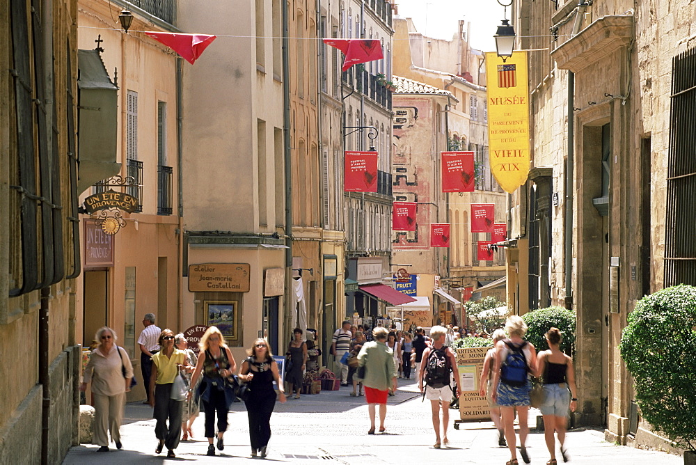 People in the Rue Gaston-de-Saporta, Aix-en-Provence, Bouches du Rhone, Provence, France, Europe