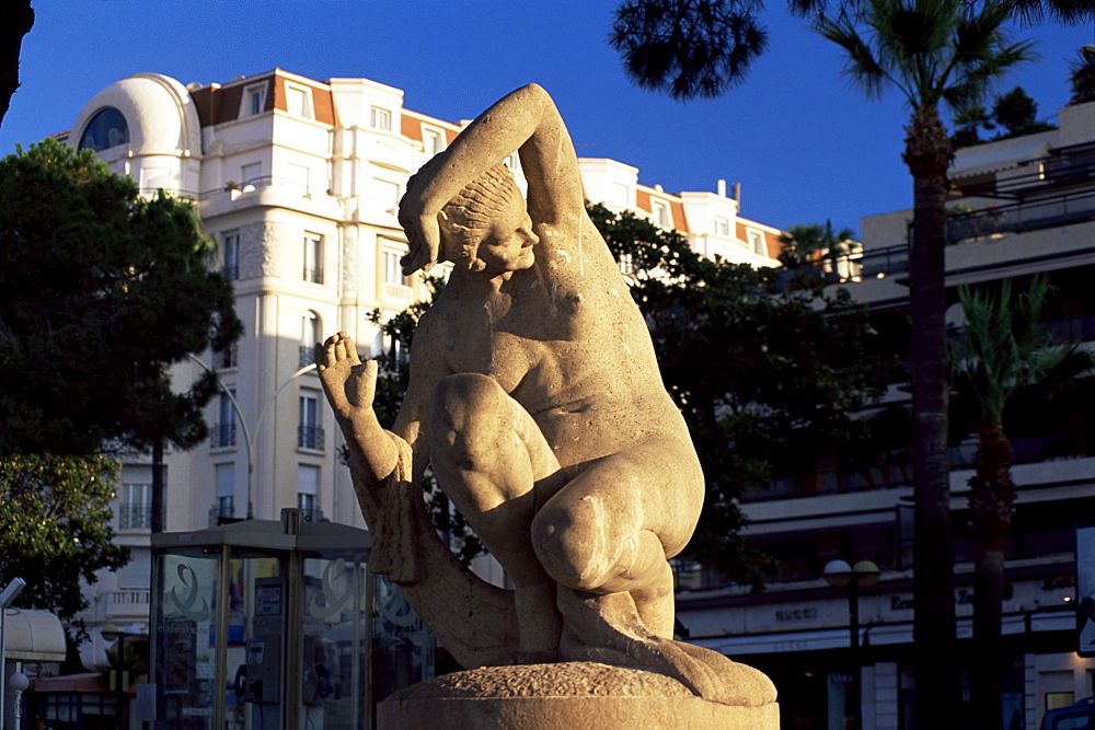 Stone sculpture on the Bouevard de la Croisette, Cannes, Alpes-Maritimes, Cote d'Azur, French Riviera, Provence, France, Europe