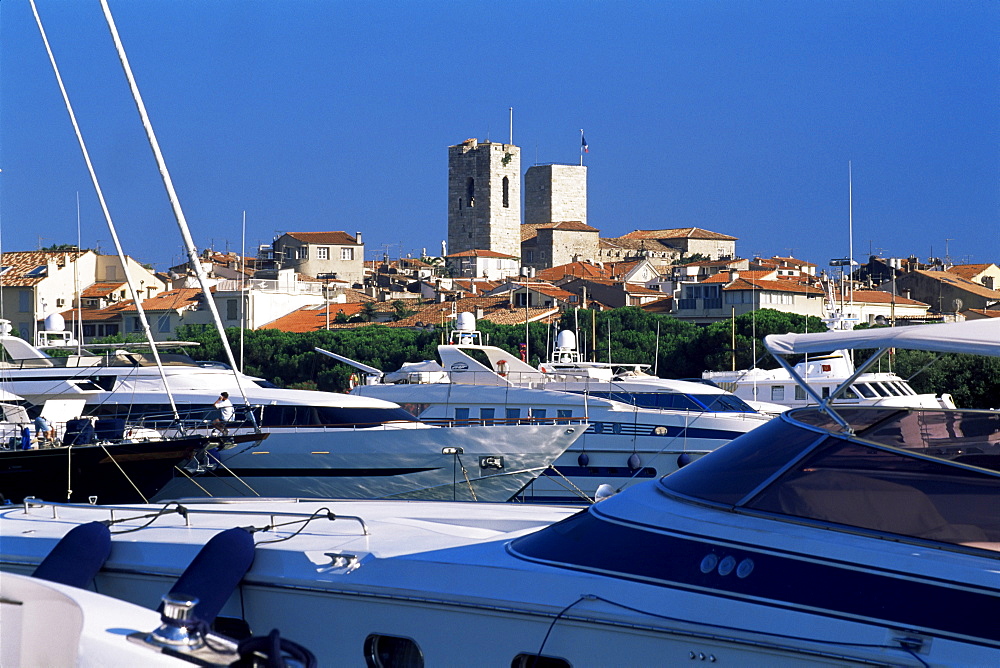 Old Town beyond yachts in Port Vauban marina, Antibes, Alpes-Maritimes, Cote d'Azur, French Riviera, Provence, France, Europe