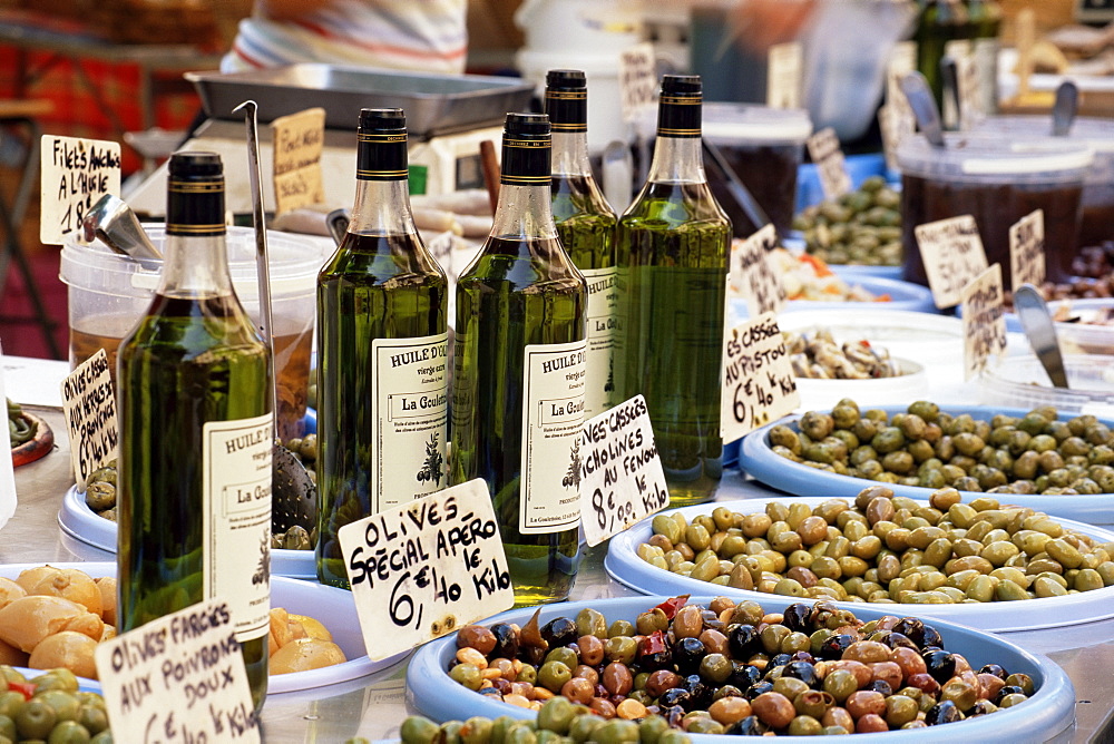 Olives and olive oil on sale at a market, Cassis, Bouches-de-Rhone, Provence-Alpes-Cote-d'Azur, France, Europe