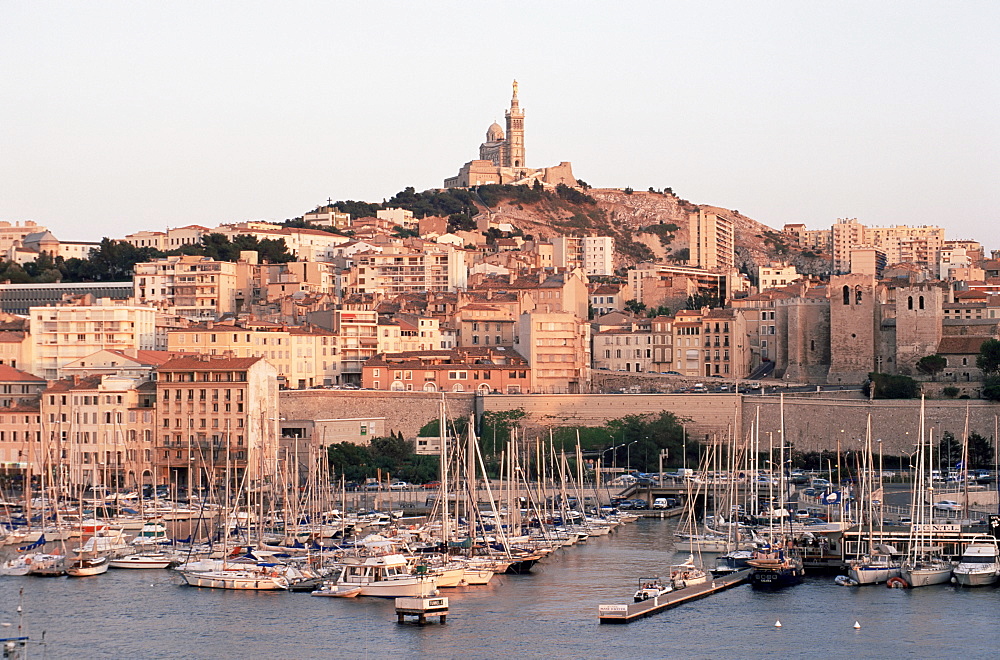 View across the Vieux Port to Basilica of Notre Dame de la Garde, Marseille, Bouches-de-Rhone, Provence-Alpes-Cote-d'Azur, France, Europe