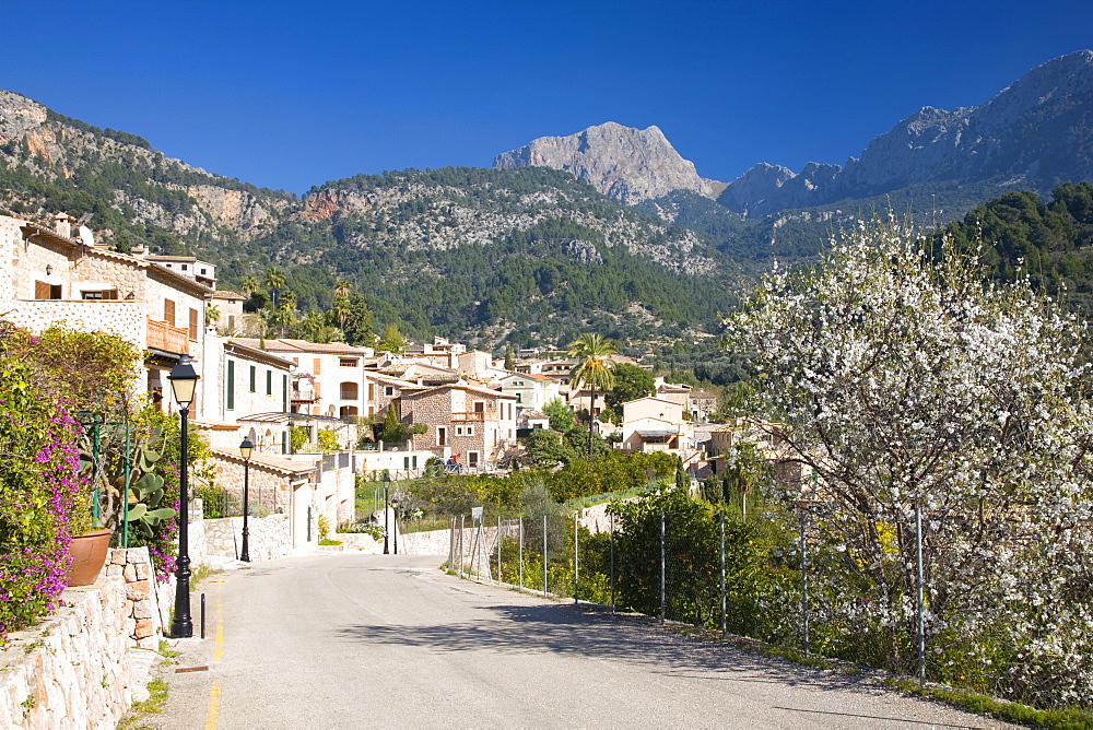 View along village street to Puig Major, the island's highest peak, Fornalutx, near Soller, Mallorca, Balearic Islands, Spain, Europe