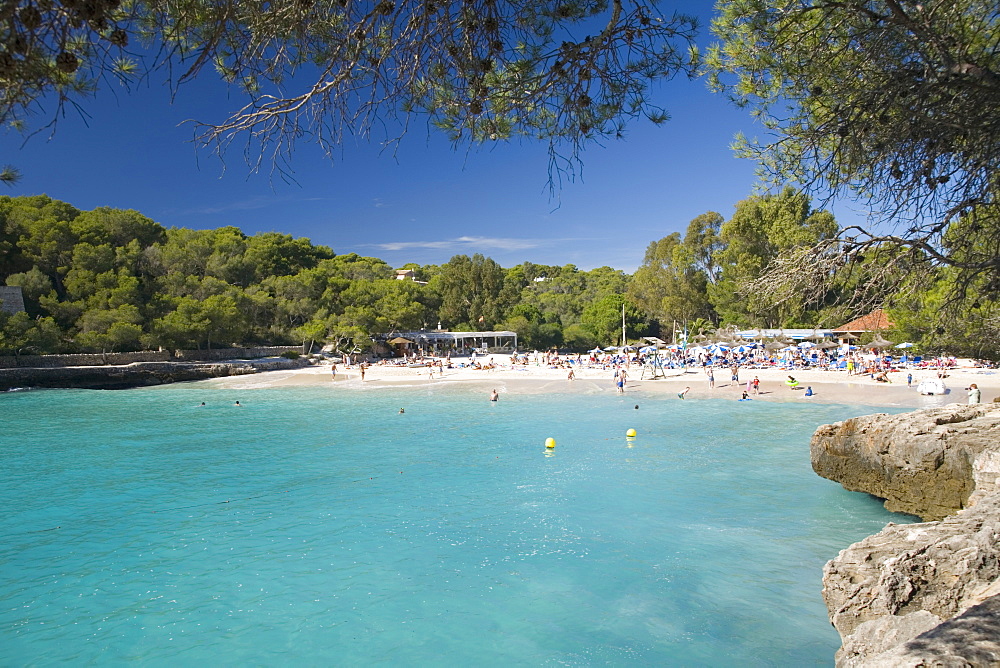 View across the turquoise waters of Cala Mondrago, Parc Natural de Mondrago, near Portopetro, Mallorca, Balearic Islands, Spain, Mediterranean, Europe