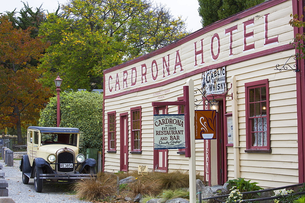 Vintage car and facade of the historic Cardrona Hotel, Cardrona, near Wanaka, Queenstown-Lakes district, Otago, South Island, New Zealand, Pacific