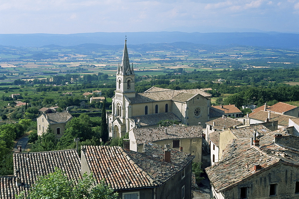 View over village and church to Luberon countryside, Bonnieux, Vaucluse, Provence, France, Europe