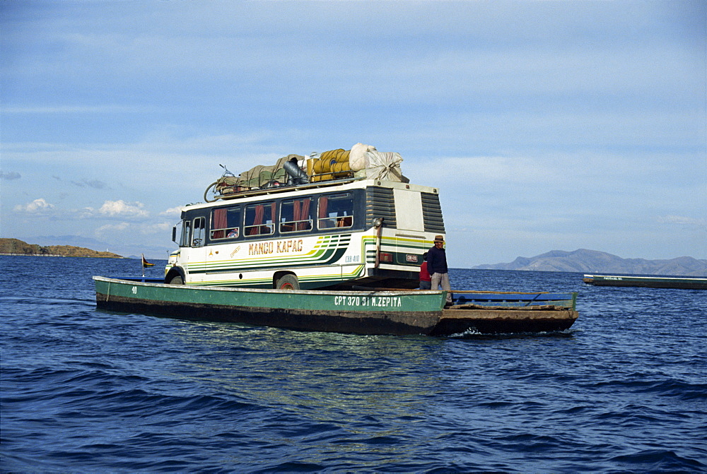 Minibus crossing Lake Titicaca on a ferry in Bolivia, South America